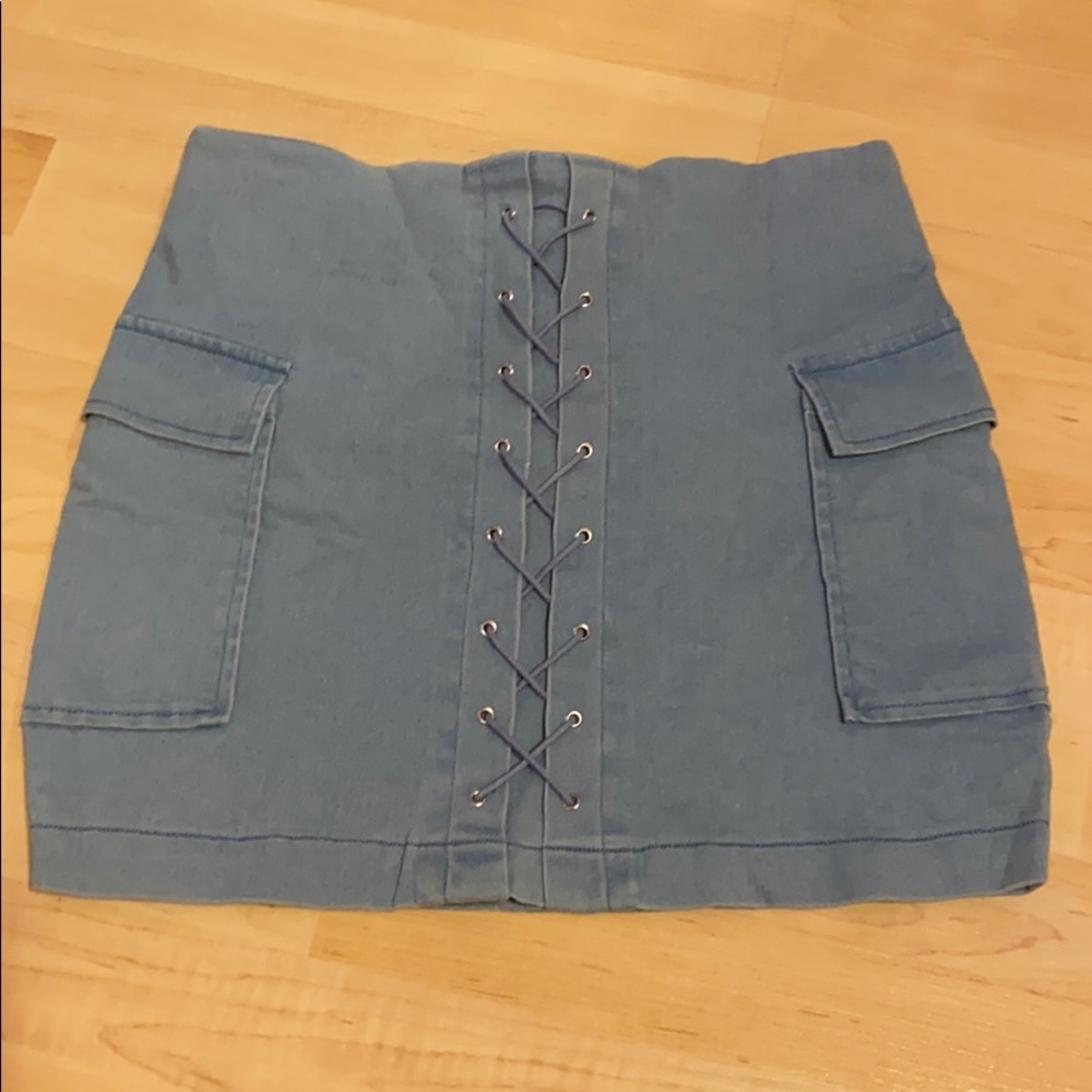 Lace up front light wash denim skirt